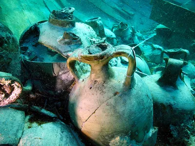 Archaeologists discovered 300 sealed pottery jugs in the wreckage.